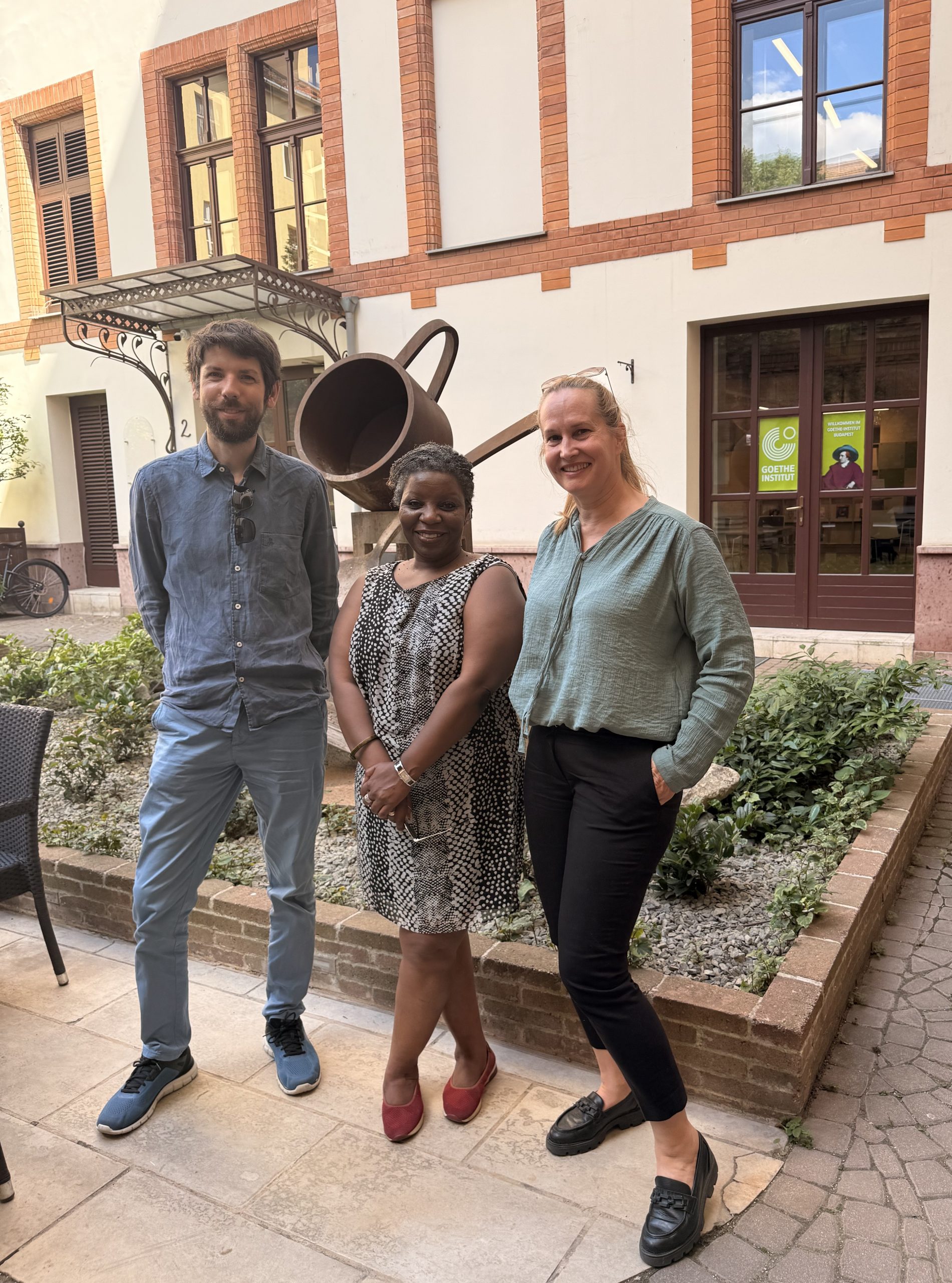Dr André Biederbeck, Dr Prue Goredema and Emese John at the Budapest home of the Goethe Institute
